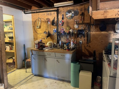Utility area with exposed ceiling joists and plumbing - 55131 Range Road 83, Rural Yellowhead, AB - Indoor Photo Showing Basement