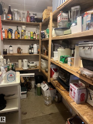 This area features ample storage with extensive shelving - 55131 Range Road 83, Rural Yellowhead, AB - Indoor With Storage