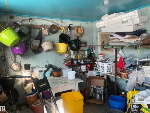 This room features light blue walls and a matching ceiling, with a white light fixture - 55131 Range Road 83, Rural Yellowhead, AB - Indoor