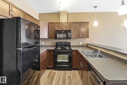 324 2503 Hanna Crescent, Edmonton, AB - Indoor Photo Showing Kitchen With Double Sink
