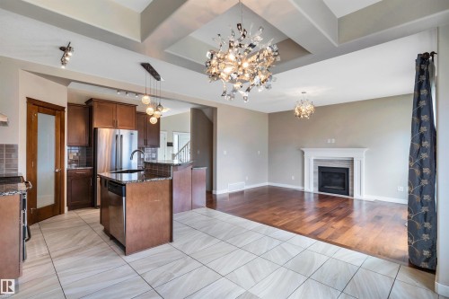 1461 Watt Drive, Edmonton, AB - Indoor Photo Showing Kitchen With Fireplace