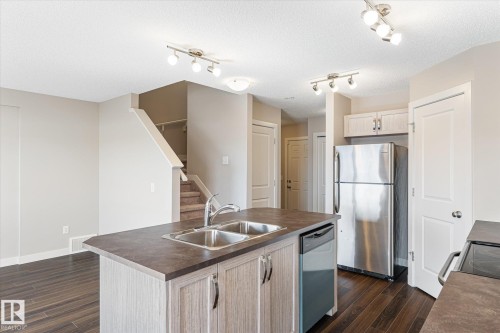 3217 11 Avenue, Edmonton, AB - Indoor Photo Showing Kitchen With Double Sink