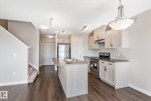 3217 11 Avenue, Edmonton, AB - Indoor Photo Showing Kitchen With Double Sink