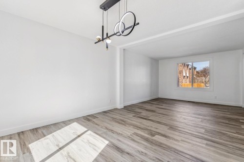 The property features light-colored walls and modern plank flooring throughout - 95 Ridgewood Terrace, St. Albert, AB - Indoor
