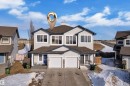 The property features a two-story design with light-colored siding and dark trim - 3609 11 Street, Edmonton, AB  - Outdoor 