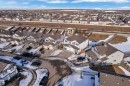 Aerial view of the property and surrounding neighborhood, featuring residential homes with attached garages, and a clear sky - 3609 11 Street, Edmonton, AB  - Outdoor With View 