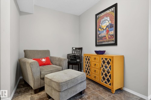 This room features light grey walls and tiled flooring - 215 1080 Mcconachie Boulevard, Edmonton, AB - Indoor