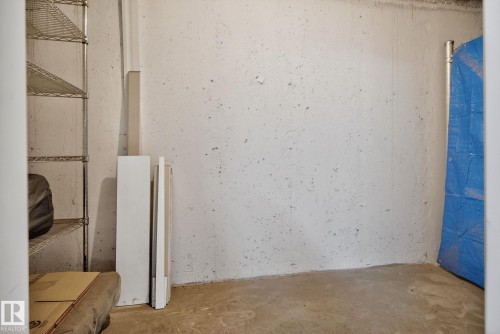 Room featuring concrete walls and flooring - 215 1080 Mcconachie Boulevard, Edmonton, AB - Indoor