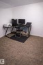 This room features textured carpet flooring and white walls - 844 Erin Place, Edmonton, AB  - Indoor Photo Showing Office 