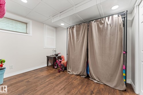 The property features wood-style flooring and recessed lighting - 7252 152C Avenue, Edmonton, AB - Indoor