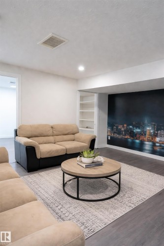 2122 52A Street, Edmonton, AB - Indoor Photo Showing Living Room With Fireplace