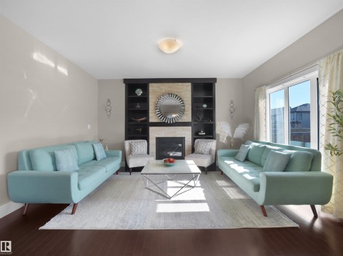 3694 Claxton Place, Edmonton, AB - Indoor Photo Showing Living Room With Fireplace