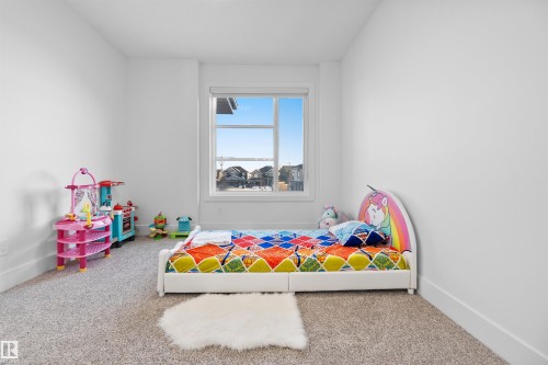3904 Ginsburg Crescent, Edmonton, AB - Indoor Photo Showing Bedroom