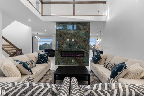 3904 Ginsburg Crescent, Edmonton, AB - Indoor Photo Showing Living Room With Fireplace