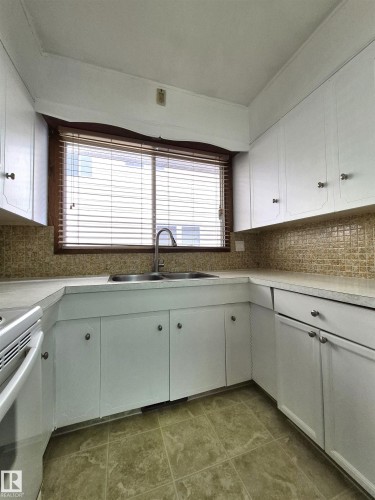 8725 152 Street, Edmonton, AB - Indoor Photo Showing Kitchen With Double Sink