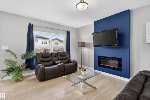 42 Prescott Boulevard, Spruce Grove, AB - Indoor Photo Showing Living Room With Fireplace