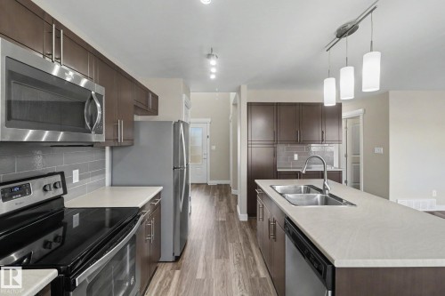 2547 Amerongen Crescent, Edmonton, AB - Indoor Photo Showing Kitchen With Double Sink With Upgraded Kitchen