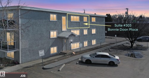 Exterior view of the property with a textured facade and several windows - 303 8215 83 Avenue, Edmonton, AB - Outdoor