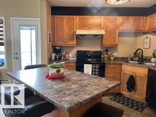 1426 330 Clareview Station Drive, Edmonton, AB - Indoor Photo Showing Kitchen With Double Sink