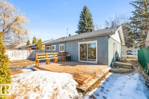 The property features a spacious wooden deck with integrated seating - 13108 133 Street, Edmonton, AB - Outdoor With Deck Patio Veranda