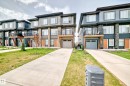 The property features a contemporary architectural style with multi-level construction - 7822 Koruluk Link Link, Edmonton, AB  - Outdoor With Balcony With Facade 