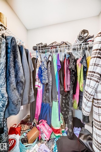 Walk-in closet featuring wire shelving - 7822 Koruluk Link Link, Edmonton, AB - Indoor With Storage