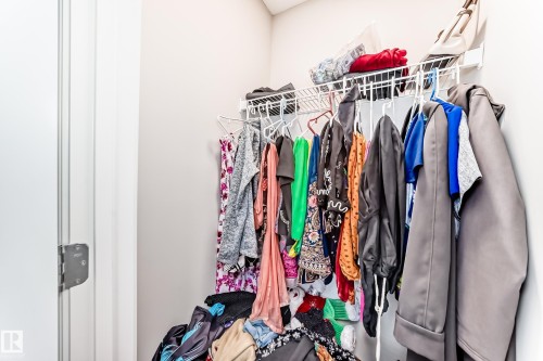 Closet featuring a wire shelving unit and a hanging rod for organization - 7822 Koruluk Link Link, Edmonton, AB - Indoor With Storage