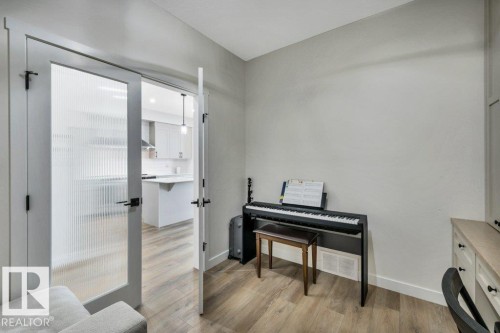 The property features durable flooring and a neutral color palette - 13007 213 Street, Edmonton, AB - Indoor Photo Showing Other Room