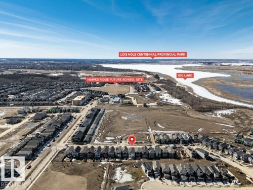 Aerial view showcasing the property's location within a developed community, with views of Big Lake and Lois Hole Centennial Provincial Park - 13007 213 Street, Edmonton, AB - Outdoor With View