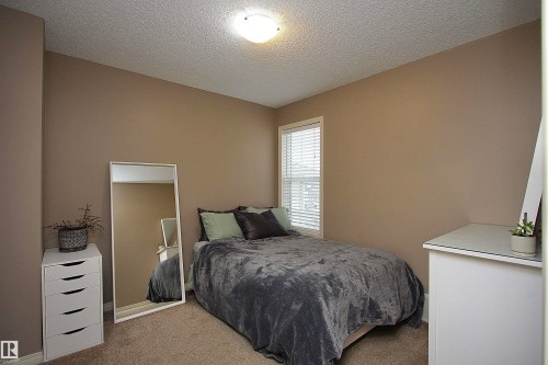 7 Ashgrove, Spruce Grove, AB - Indoor Photo Showing Bedroom