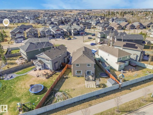 Aerial view of the property and its surrounding neighbourhood, featuring paved streets and established homes - 3910 49 Avenue, Beaumont, AB - Outdoor With View