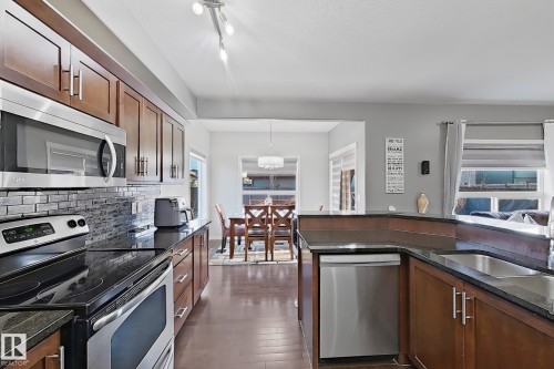 3215 22 Avenue, Edmonton, AB - Indoor Photo Showing Kitchen With Double Sink