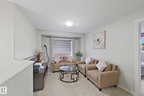 3215 22 Avenue, Edmonton, AB - Indoor Photo Showing Living Room