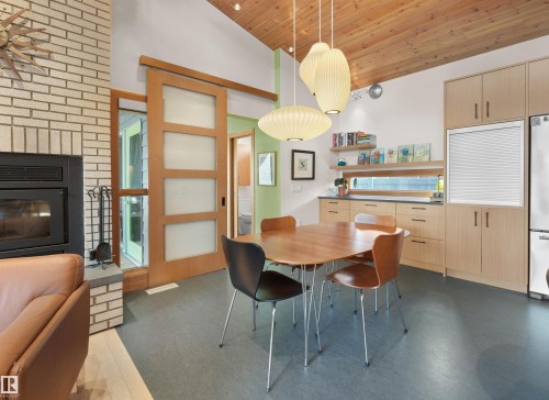 10506 137 Street, Edmonton, AB - Indoor Photo Showing Dining Room With Fireplace