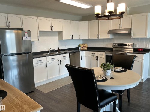 207 592 Hooke Road, Edmonton, AB - Indoor Photo Showing Kitchen With Double Sink