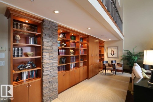 Living area with a high ceiling and recessed lighting - 1402 9707 105 Street, Edmonton, AB - Indoor