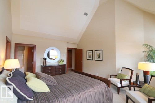 Bedroom featuring high vaulted ceiling and carpet - 1402 9707 105 Street, Edmonton, AB - Indoor Photo Showing Bedroom