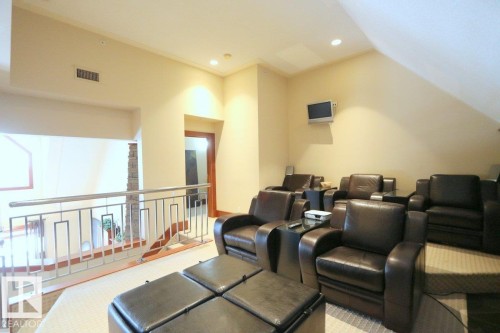 Carpeted cinema room with recessed lighting and lofted ceiling - 1402 9707 105 Street, Edmonton, AB - Indoor