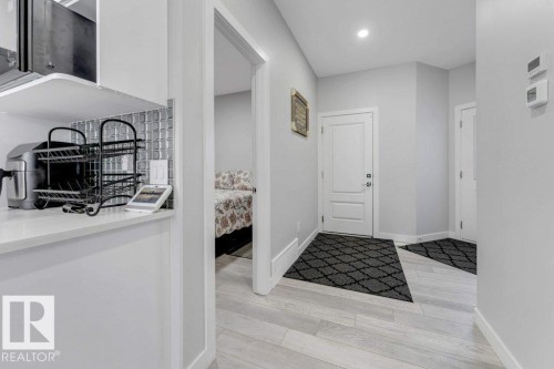 The interior features light-colored flooring, a neutral wall color, and white trim - 452 Roberts Crescent, Leduc, AB - Indoor Photo Showing Other Room