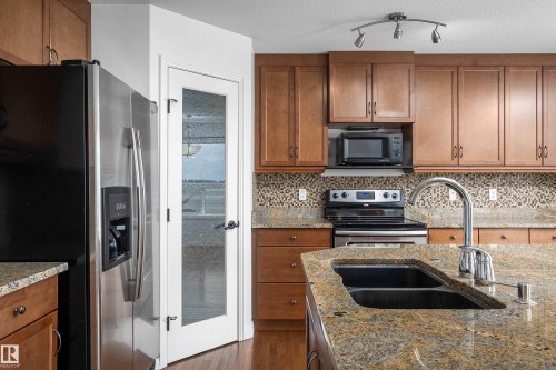 1245 Westerra Crescent, Stony Plain, AB - Indoor Photo Showing Kitchen With Double Sink