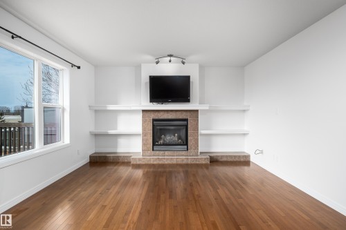 1245 Westerra Crescent, Stony Plain, AB - Indoor Photo Showing Living Room With Fireplace
