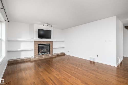 1245 Westerra Crescent, Stony Plain, AB - Indoor Photo Showing Living Room With Fireplace
