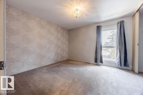 There are newer triple pane windows throughout the home keeping the cold out in Winter and the hot out in Summer. - 12032 25 Avenue, Edmonton, AB - Indoor Photo Showing Other Room