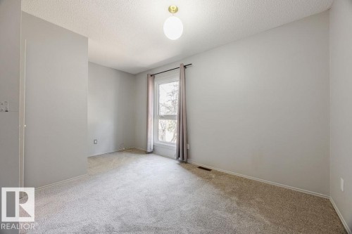 The second large bedroom. - 12032 25 Avenue, Edmonton, AB - Indoor Photo Showing Other Room