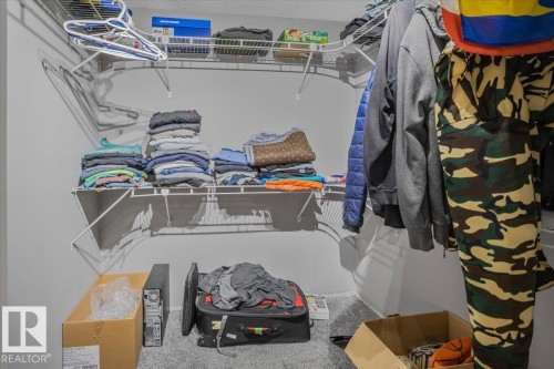 Closet featuring built-in wire shelving and a clothes hanging rod - 3119 32 Avenue, Edmonton, AB - Indoor With Storage