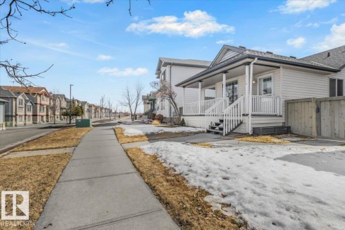 This property features a single-story design with white siding and a covered porch - 3119 32 Avenue, Edmonton, AB - Outdoor
