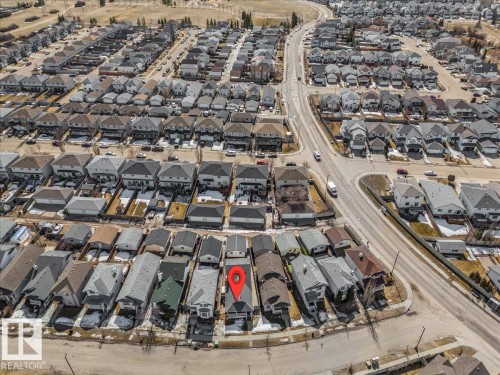 Aerial view of the property and the surrounding neighborhood, featuring residential streets and numerous detached homes - 3119 32 Avenue, Edmonton, AB - Outdoor With View
