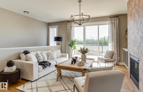 100 Redpoll Wynd, St. Albert, AB - Indoor Photo Showing Living Room With Fireplace