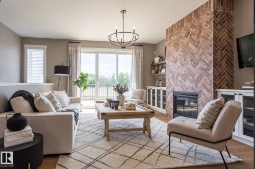 100 Redpoll Wynd, St. Albert, AB - Indoor Photo Showing Living Room With Fireplace