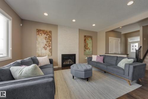 3825 Agar Green, Edmonton, AB - Indoor Photo Showing Living Room With Fireplace